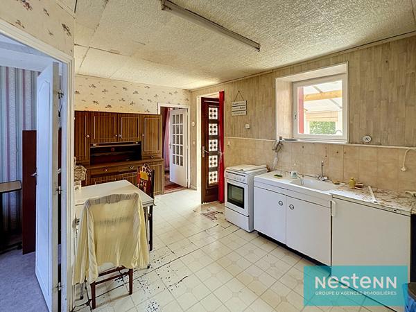 Vente d'une maison en pierres à rénover avec grenier aménageable dans le Bourg de Meslin