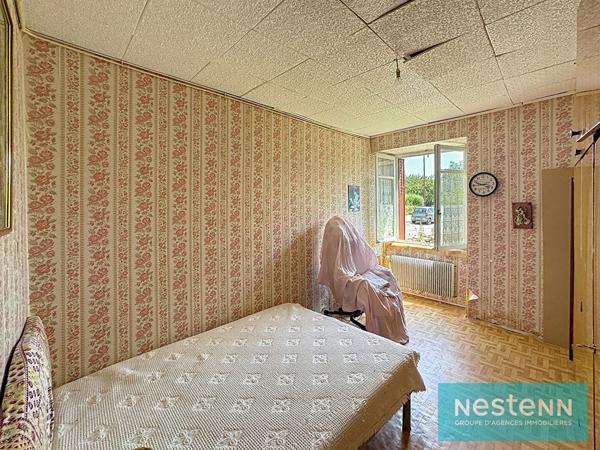Vente d'une maison en pierres à rénover avec grenier aménageable dans le Bourg de Meslin