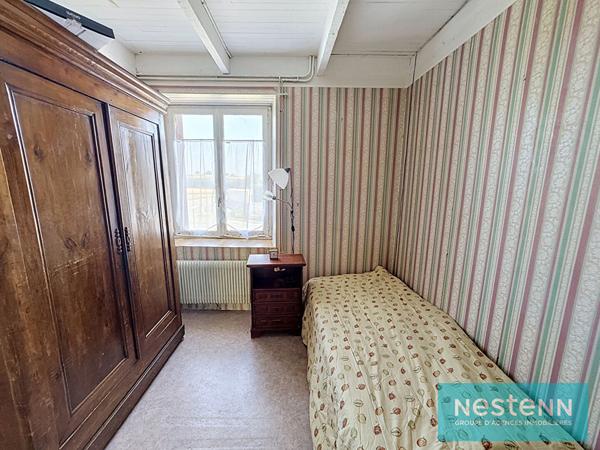 Vente d'une maison en pierres à rénover avec grenier aménageable dans le Bourg de Meslin