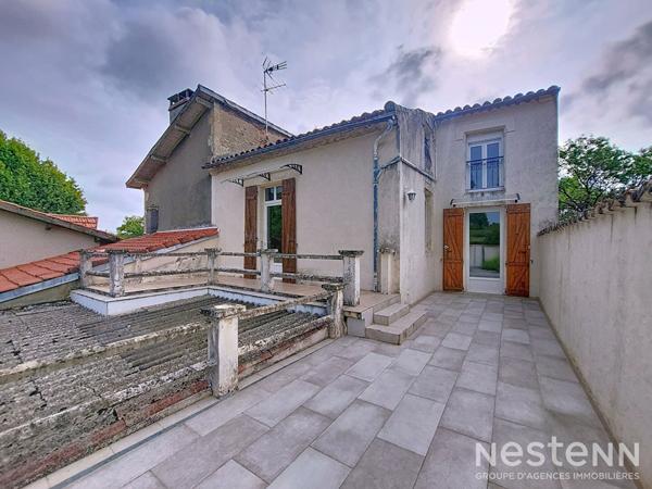 A Vendre Maison en Pierre rénovée de 225 m² avec Terrasses et Jardin proche du centre de Condom