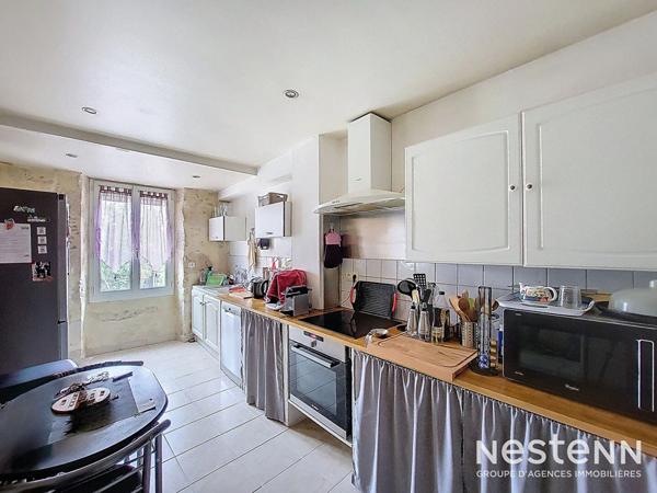 A Vendre Maison en Pierre rénovée de 225 m² avec Terrasses et Jardin proche du centre de Condom