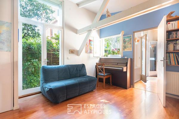 Maison avec terrasse arborée à la lisière du 20e