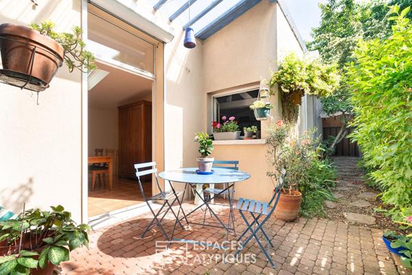 Maison avec terrasse arborée à la lisière du 20e