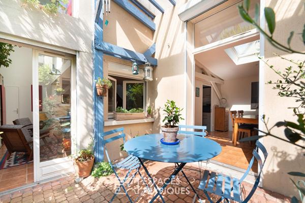 Maison avec terrasse arborée à la lisière du 20e