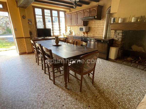 ensemble immobilier sur 1700m2 avec deux maisons, grange atelier jardin et puits