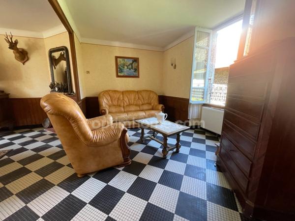 ensemble immobilier sur 1700m2 avec deux maisons, grange atelier jardin et puits