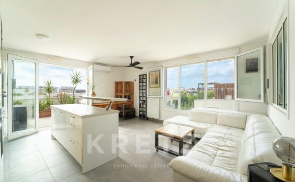 Appartement T4 dernier étage avec vue panoramique sur Port-Marianne et le parc Charpak