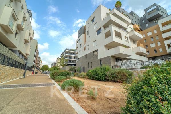 Appartement T4 dernier étage avec vue panoramique sur Port-Marianne et le parc Charpak