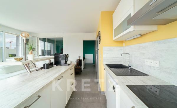 Appartement T4 dernier étage avec vue panoramique sur Port-Marianne et le parc Charpak