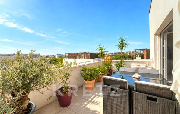 Appartement T4 dernier étage avec vue panoramique sur Port-Marianne et le parc Charpak