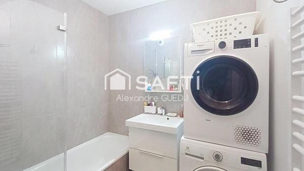 GRAND APPARTEMENT T4 DE 100M² AVEC TERRASSE, 2 GARAGES ET UNE CAVE