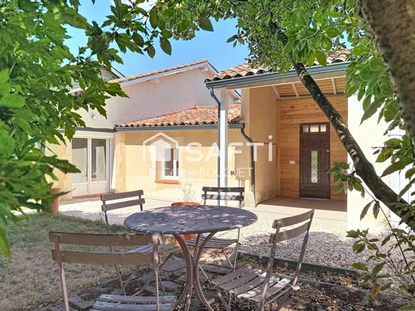 Maison de ville avec jardin, garage et dépendances