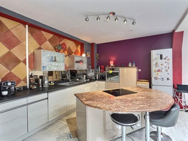Loft lumineux de 115 m² avec terrasse — Quartier gare