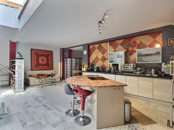 Loft lumineux de 115 m² avec terrasse — Quartier gare