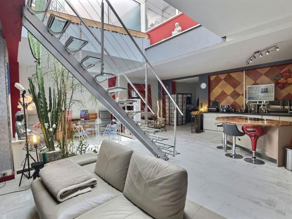 Loft lumineux de 115 m² avec terrasse — Quartier gare