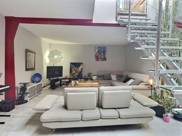 Loft lumineux de 115 m² avec terrasse — Quartier gare