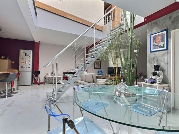 Loft lumineux de 115 m² avec terrasse — Quartier gare