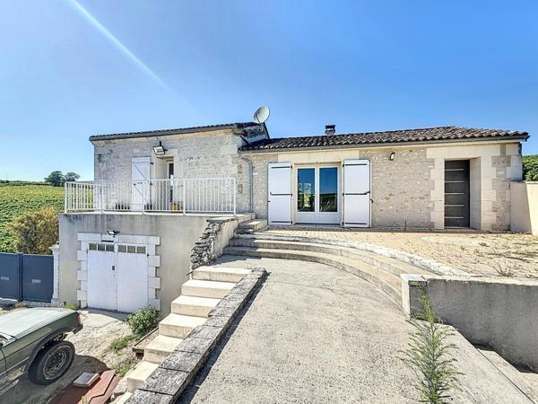 Maison de 170m² avec trois garages en pleine campagne