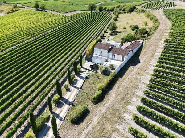 Maison de 170m² avec trois garages en pleine campagne