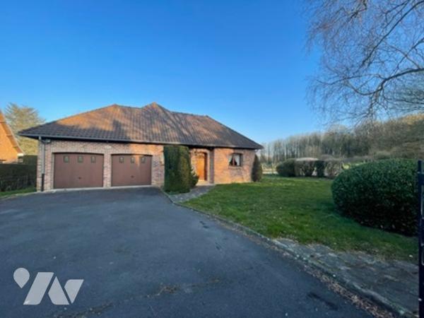 UNE MAISON A USAGE D'HABITATION