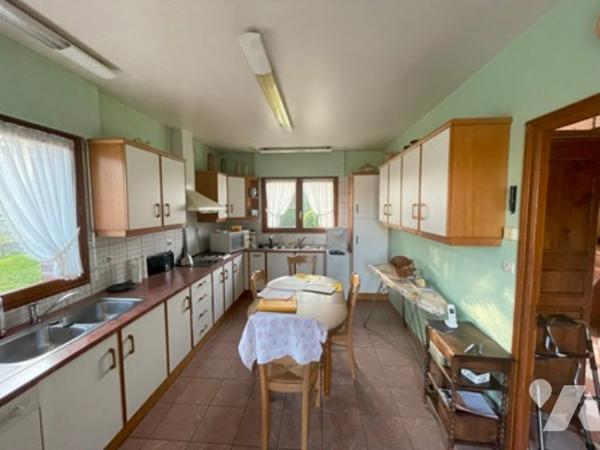 UNE MAISON A USAGE D'HABITATION