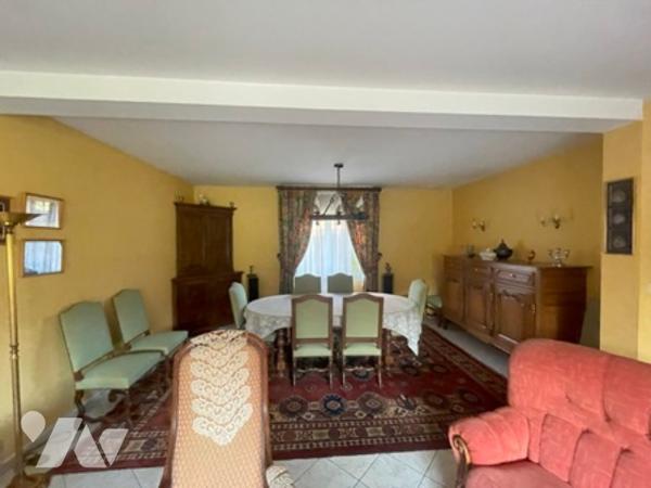 UNE MAISON A USAGE D'HABITATION