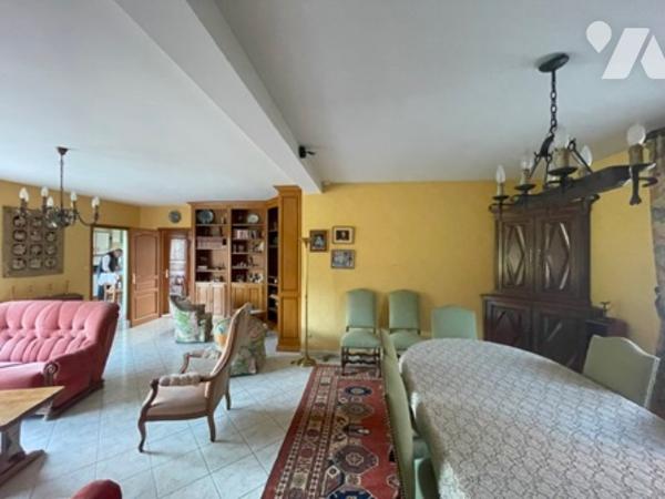 UNE MAISON A USAGE D'HABITATION