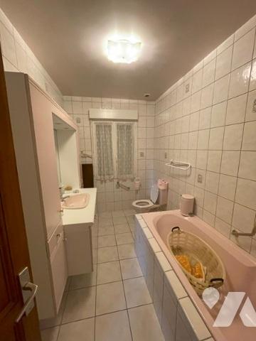 UNE MAISON A USAGE D'HABITATION