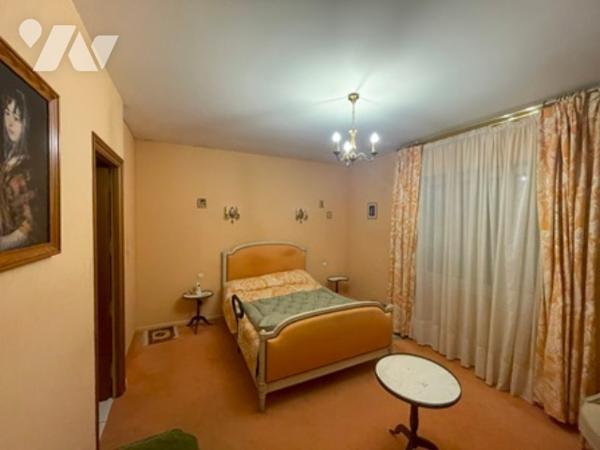 UNE MAISON A USAGE D'HABITATION