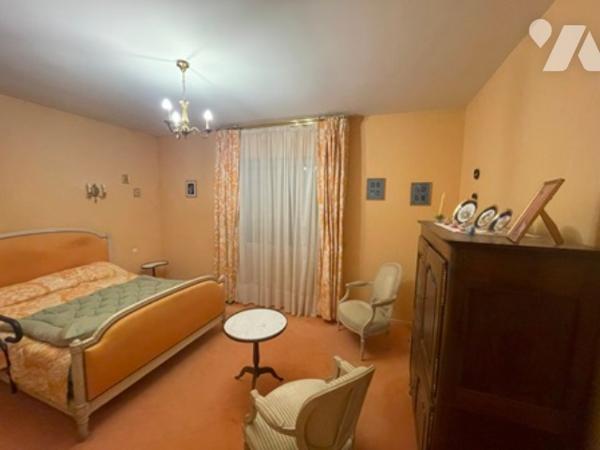 UNE MAISON A USAGE D'HABITATION