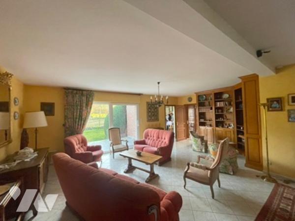 UNE MAISON A USAGE D'HABITATION