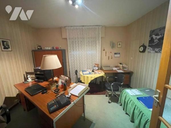 UNE MAISON A USAGE D'HABITATION