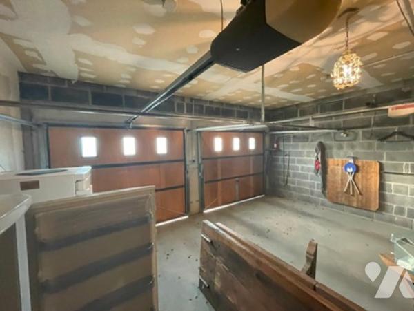 UNE MAISON A USAGE D'HABITATION