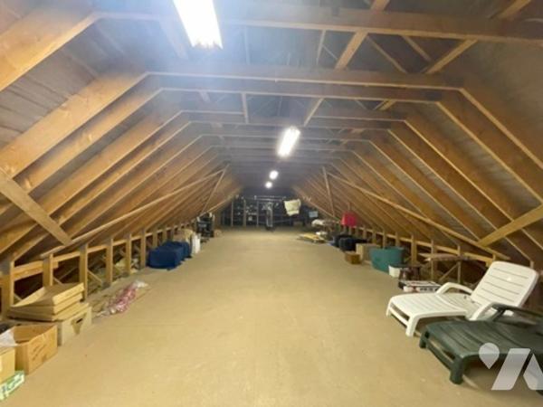 UNE MAISON A USAGE D'HABITATION