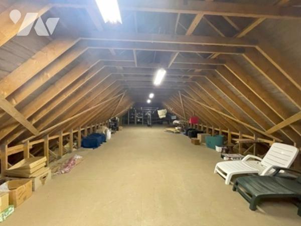 UNE MAISON A USAGE D'HABITATION