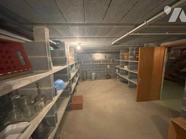 UNE MAISON A USAGE D'HABITATION