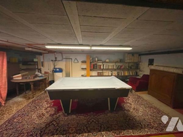 UNE MAISON A USAGE D'HABITATION