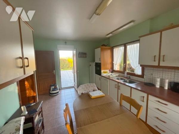 UNE MAISON A USAGE D'HABITATION