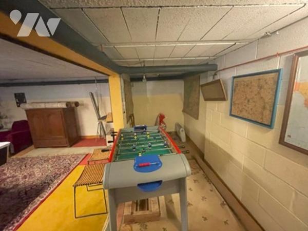 UNE MAISON A USAGE D'HABITATION