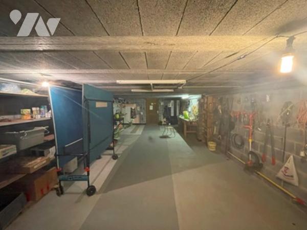 UNE MAISON A USAGE D'HABITATION