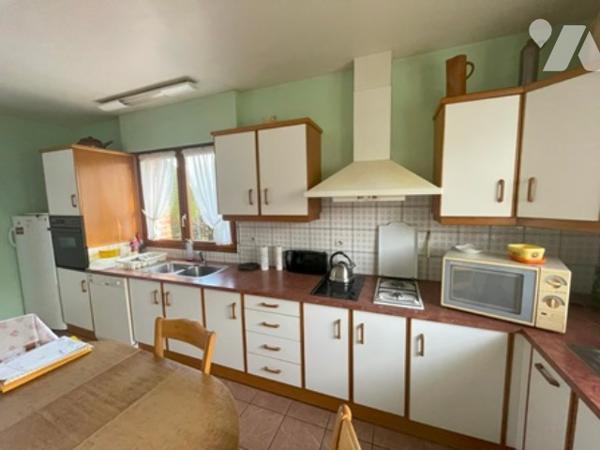 UNE MAISON A USAGE D'HABITATION