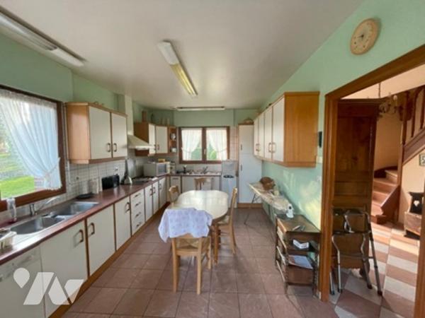 UNE MAISON A USAGE D'HABITATION