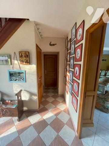 UNE MAISON A USAGE D'HABITATION