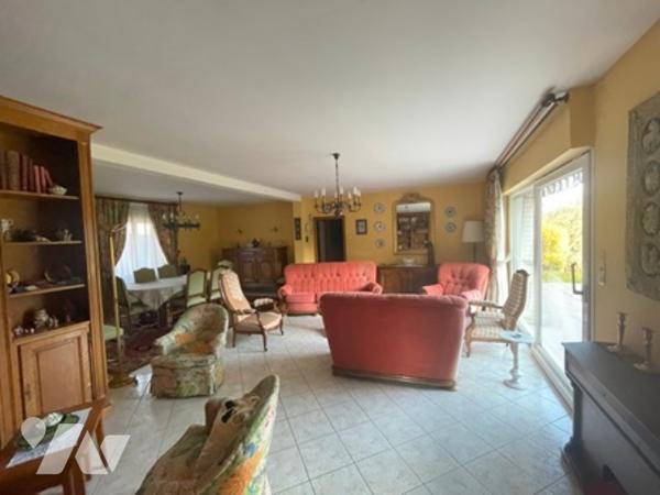 UNE MAISON A USAGE D'HABITATION