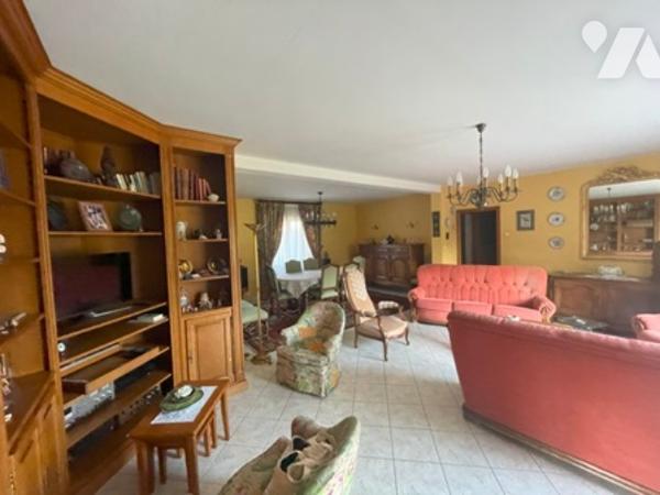 UNE MAISON A USAGE D'HABITATION