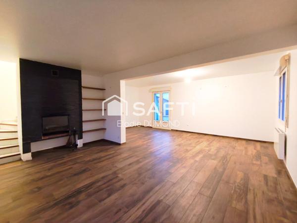 Jolie maison mitoyenne rénovée d'une surface habitable de 100 m2 sur terrain clos de 720 m2