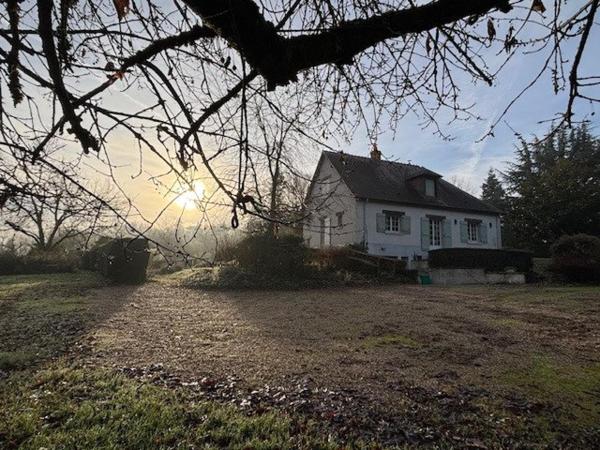 Coup de coeur pour cette belle maison et son parc boisé