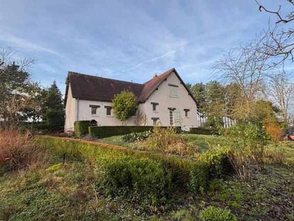 Coup de coeur pour cette belle maison et son parc boisé