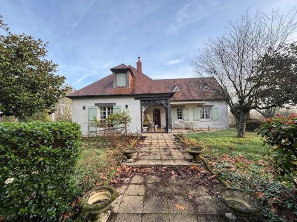 Coup de coeur pour cette belle maison et son parc boisé