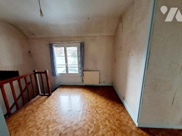 A VENDRE A AUMALE local mixte commerce/habitation proche du centre-ville